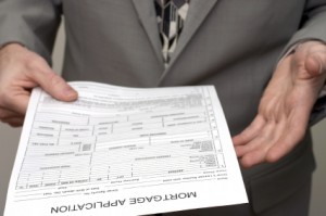a lender holding a loan application